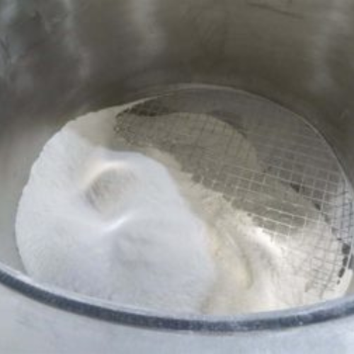 white powder for food processing in a steam jacketed kettle showcasing DCN Jet Cook's powder entrainment feature