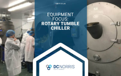 a BCH Rotary Tumble Chiller with plant operators using it to chill food in bags is behind a headline that reads 'Equipment Focus: Rotary Tumble Chiller' above the DC Norris North America logo