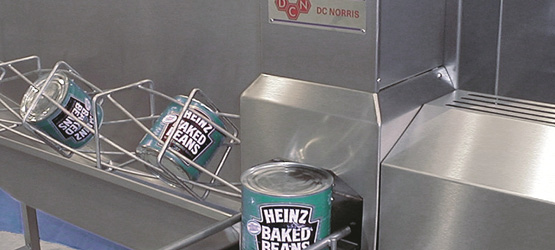 DC Norris North America's semi automatic can opener being used to open Heinz baked beans